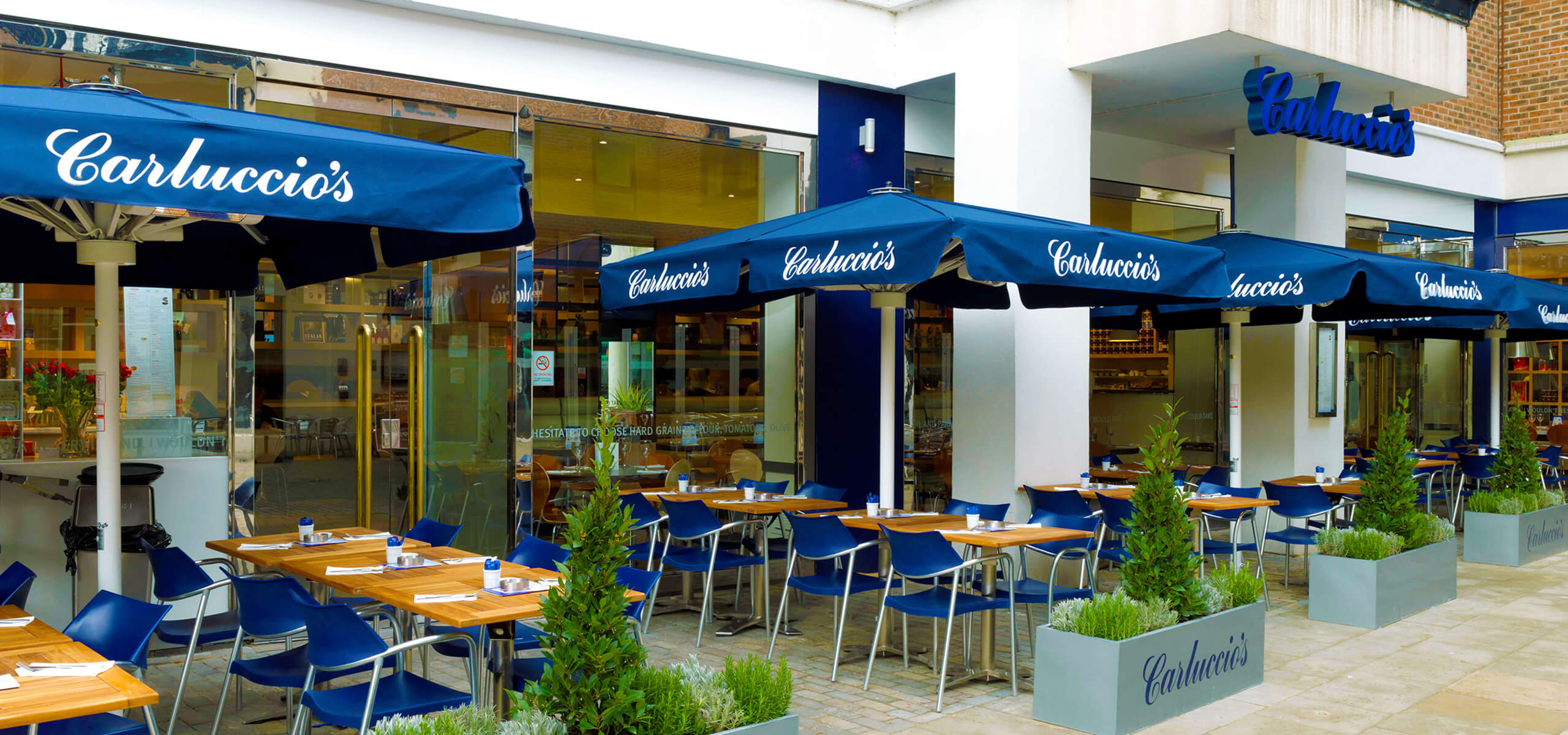 Landscape photo of a Carluccios restaurant with outside seating