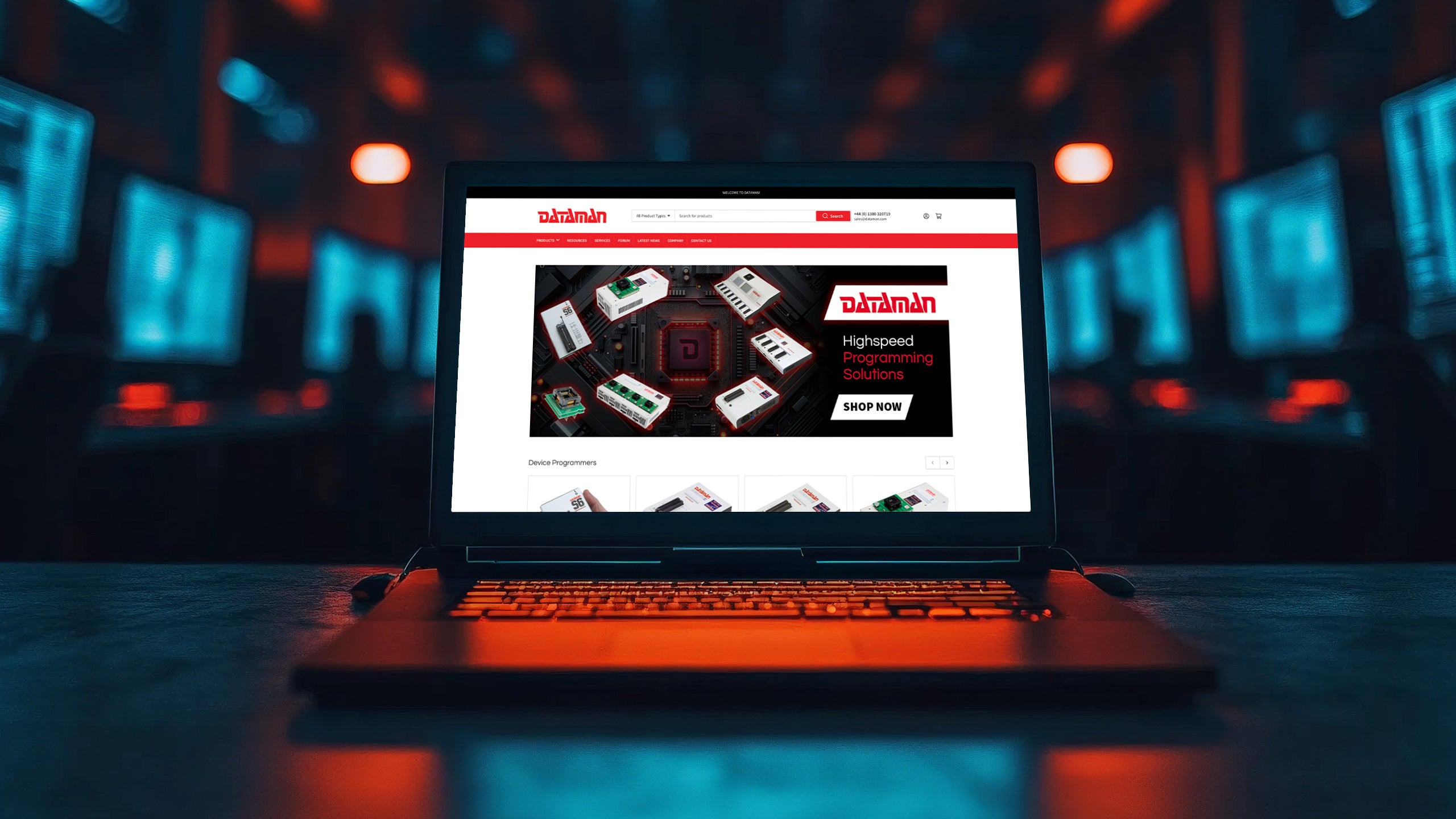 A laptop sitting on a desk displays the Dataman Shopify website design following migrating to Shopify from Magento