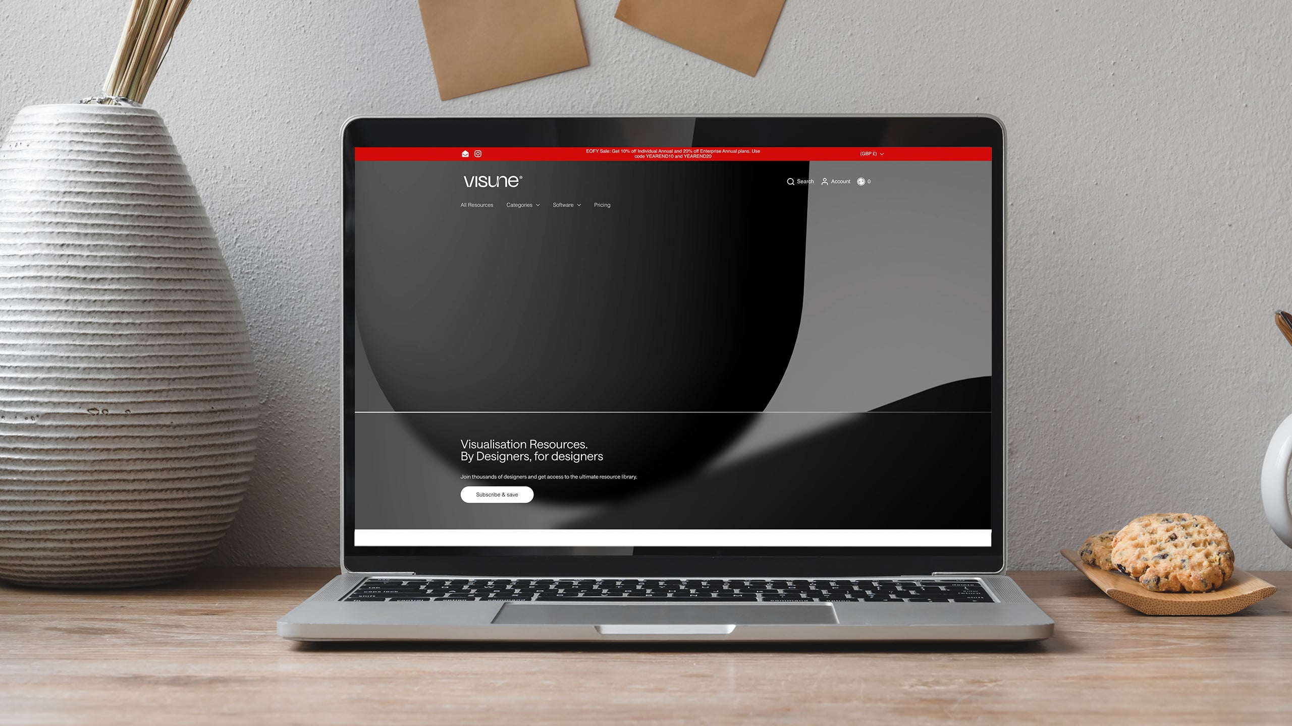 Desktop monitor displaying the Visune Shopify design against a background following a migration to Shopify Plus