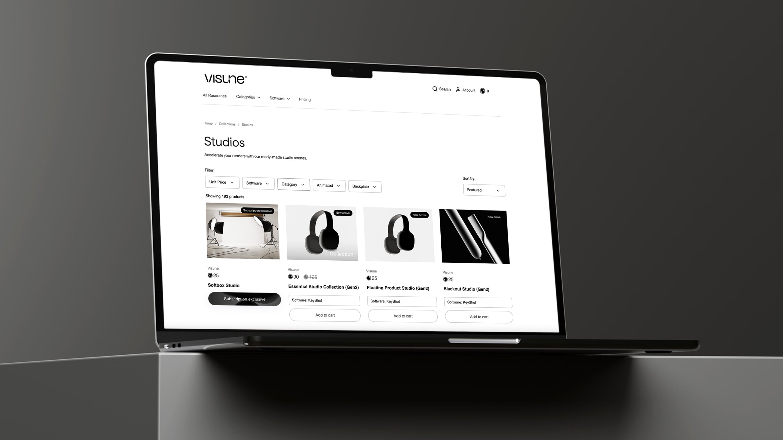 Laptop displaying a Shopify website design for Visune, with product images on a collection page.
