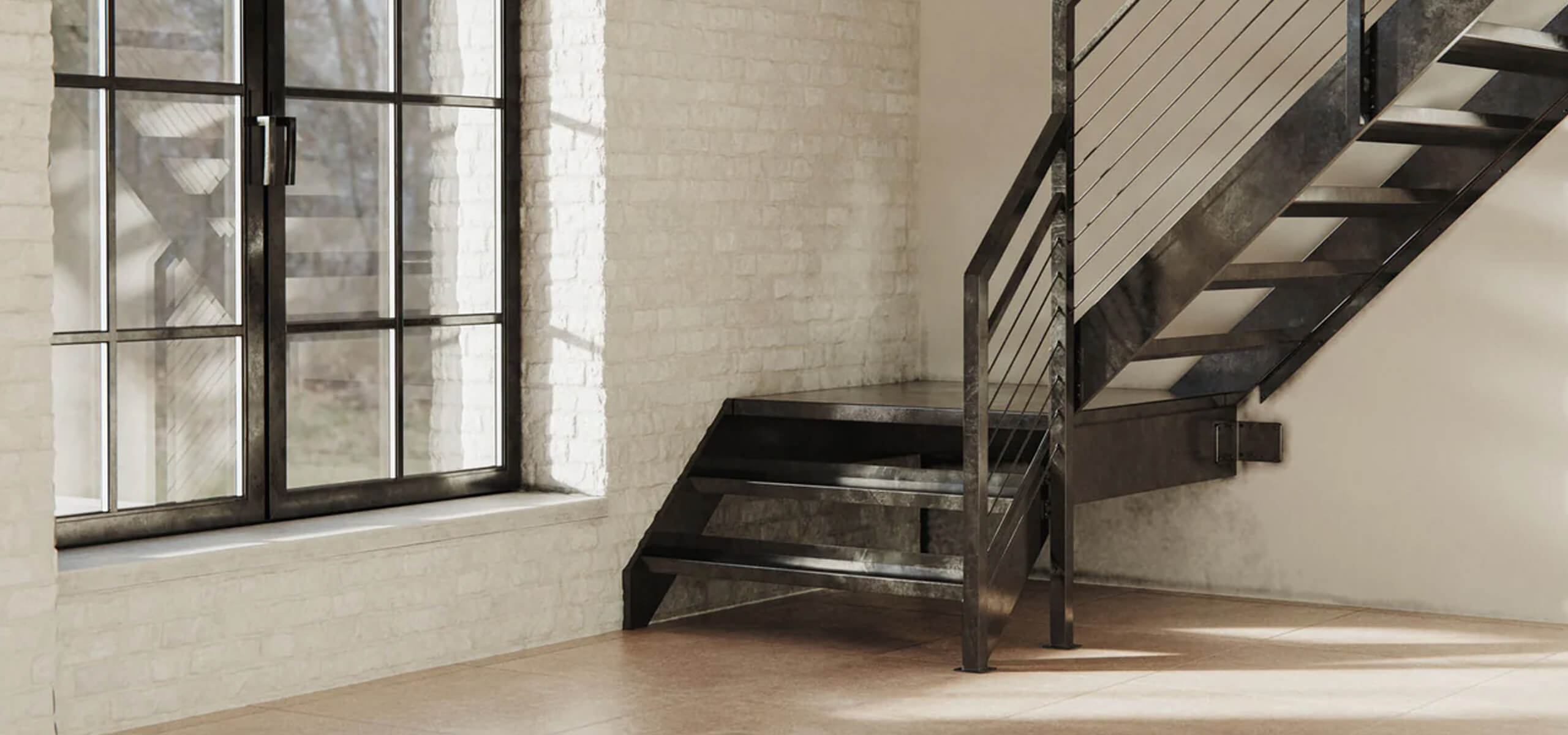 Modern staircase with metal railing in a room with large windows and exposed brick wall
