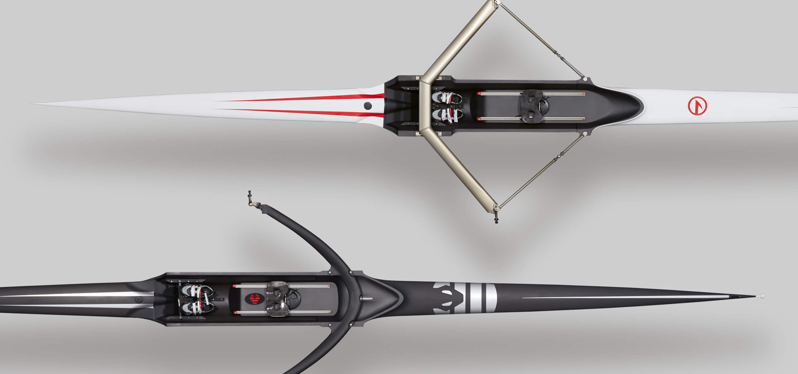 Top-down view of two racing boats from Wintech & King on a gray background
